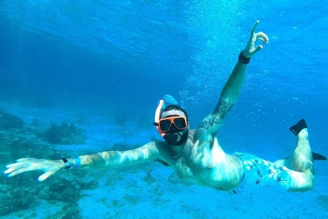 Party Catamaran Cruise with Open Bar and Snorkeling Montego Bay - The crew supplies much of the entertainment