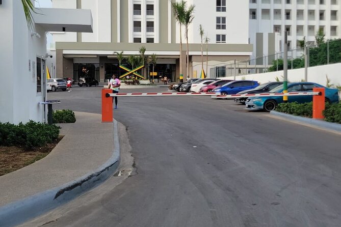 Private Airport Transfer Riu Aquarelle & Excellence Oyster Bay - A Photo Stop at the Falmouth Sign