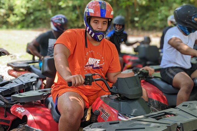 Private ATV Ride 7 Mile Beach & Rick’s Café Negril Tour - Jerk chicken in a rustic open-air setting