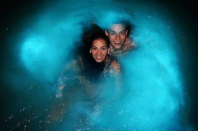 Private Luminous Blue Lagoon Night Tour in Falmouth - Entering the glowing water