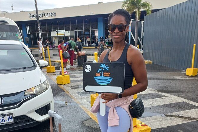 Private Montego Bay Airport Transfer to Grand Palladium - Finding your driver after the flight