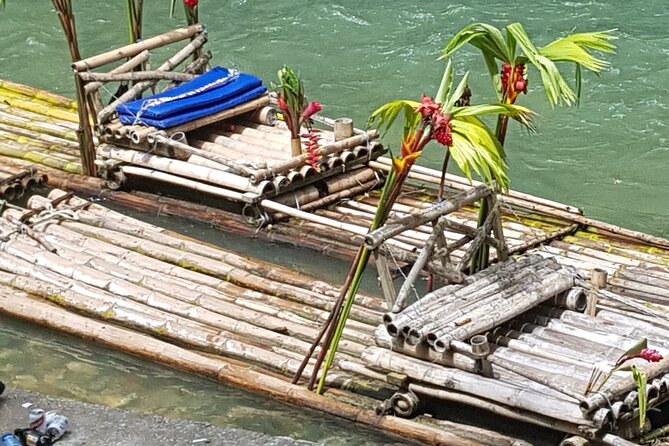 Private River Bamboo Raft with Limestone Foot Massage in Montego Bay - Coconut, jerk chicken, and rum punch