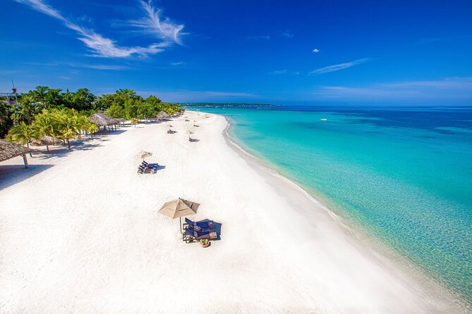 Private Tour From Ocho Rios or Runaway Bay To Negril 7 Miles Beach & Ricks Cafe - Rick’s Cafe combines views, food, and cliff jumps