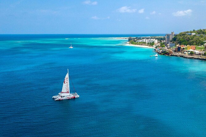 Reggae Catamaran and Snorkeling Open Bar Cruise Montego Bay - The Margaritaville stop and extra spending