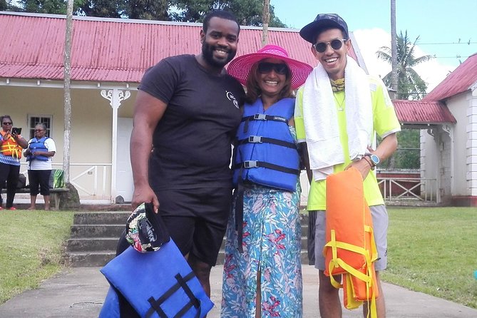 Rio Grande Bamboo Rafting Tour from Port Antonio - Boarding a bamboo raft for two