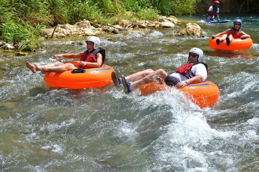 River Rapids Jungle River Tubing Adventure - Calm water beneath the Jamaican rainforest