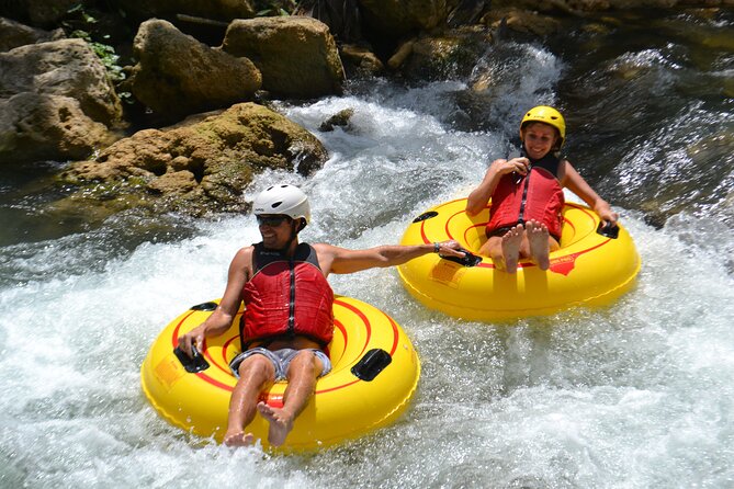 River Rapids Waterfalls Tubing and Beach Adventure with Transport - The jungle walk, waterfall option, and cool water
