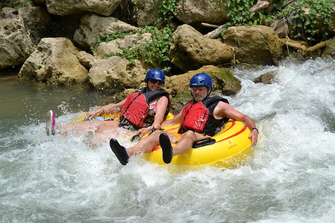 River Rapids Waterfalls Tubing and Beach Adventure with Transport - Bamboo shade, rope swing, and a break in the river