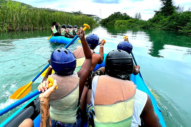 River Rapids Waterfalls Tubing and Beach Adventure with Transport - The old stone bridge and the raft finish