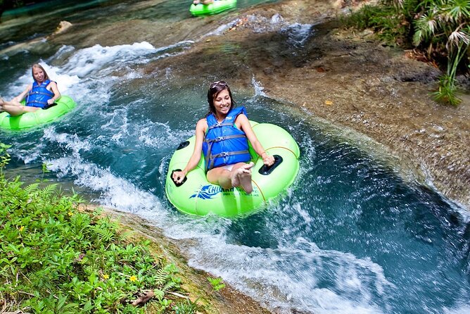 River Tubing with Private Transportation from Montego Bay - Passing the old stone bridge