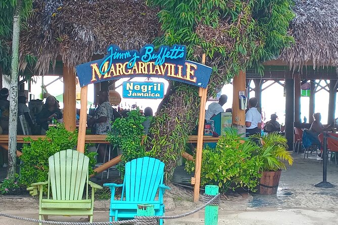 Seven Miles Beach in Negril and Ricks Cafe from Montego Bay - Food, music, and sea views at Rick’s Cafe
